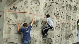 Joe and Tao try their hand on the climbing wall